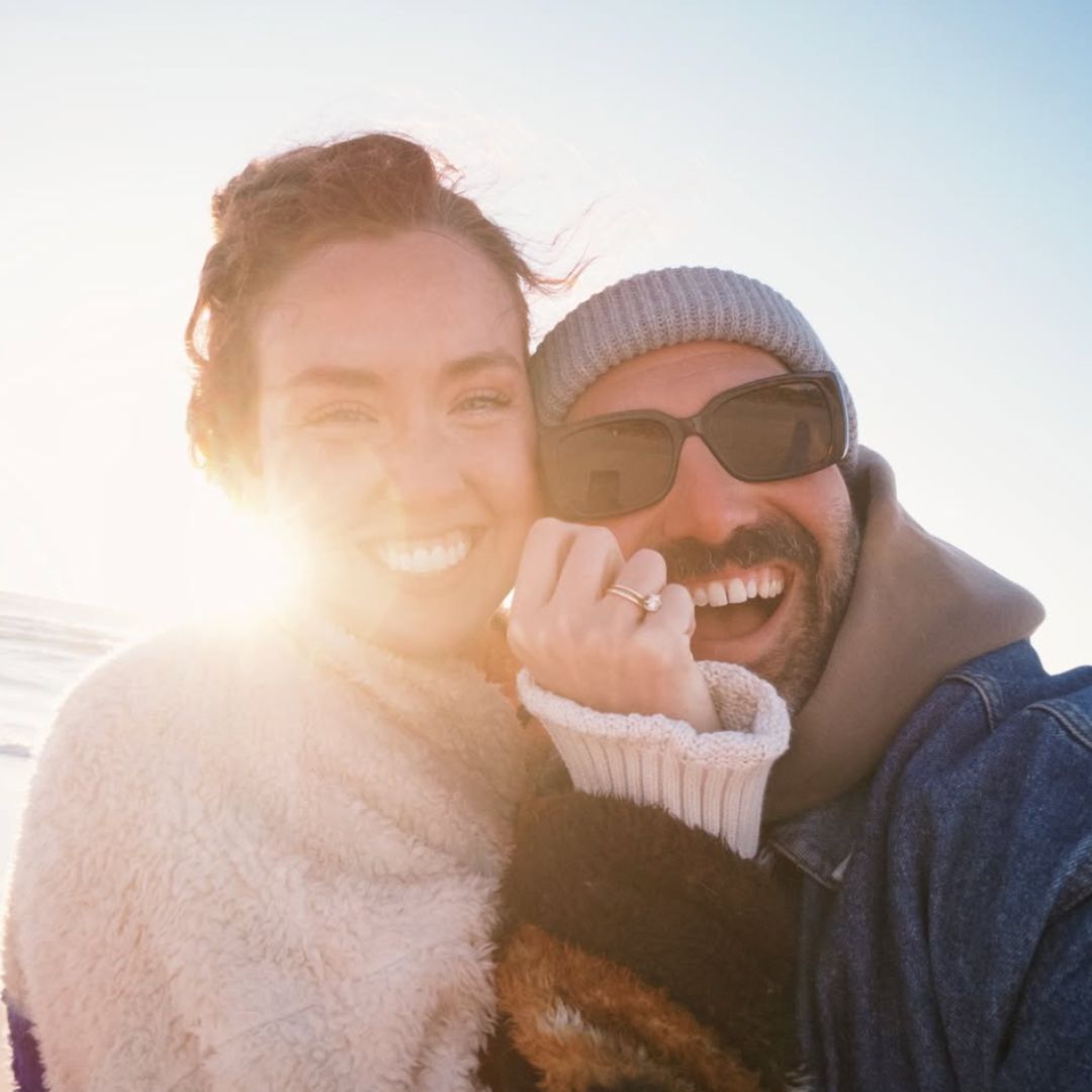 A photo of Mateo and Grace Palmitier on the beach, Haven Birth and Wellness's Practice Administrative Coordinator.