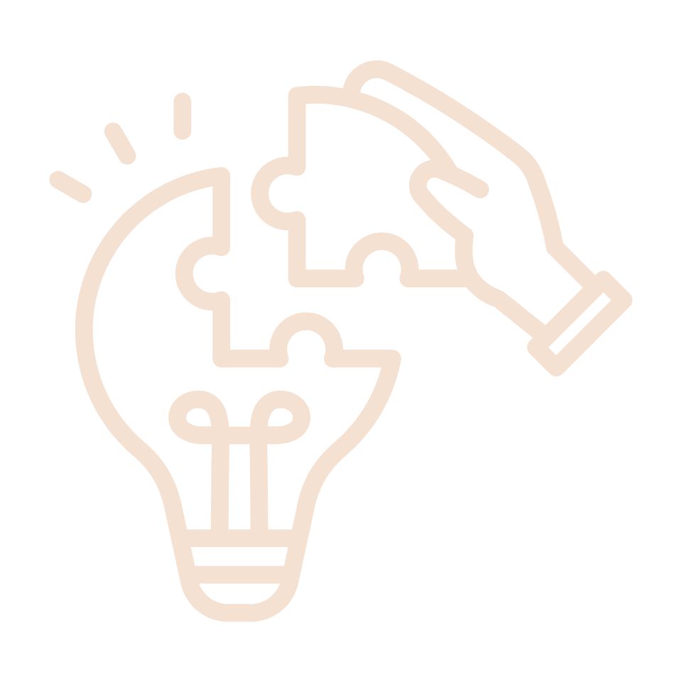 Icon illustration of a lightbulb with a hand placing a puzzle piece back into it.